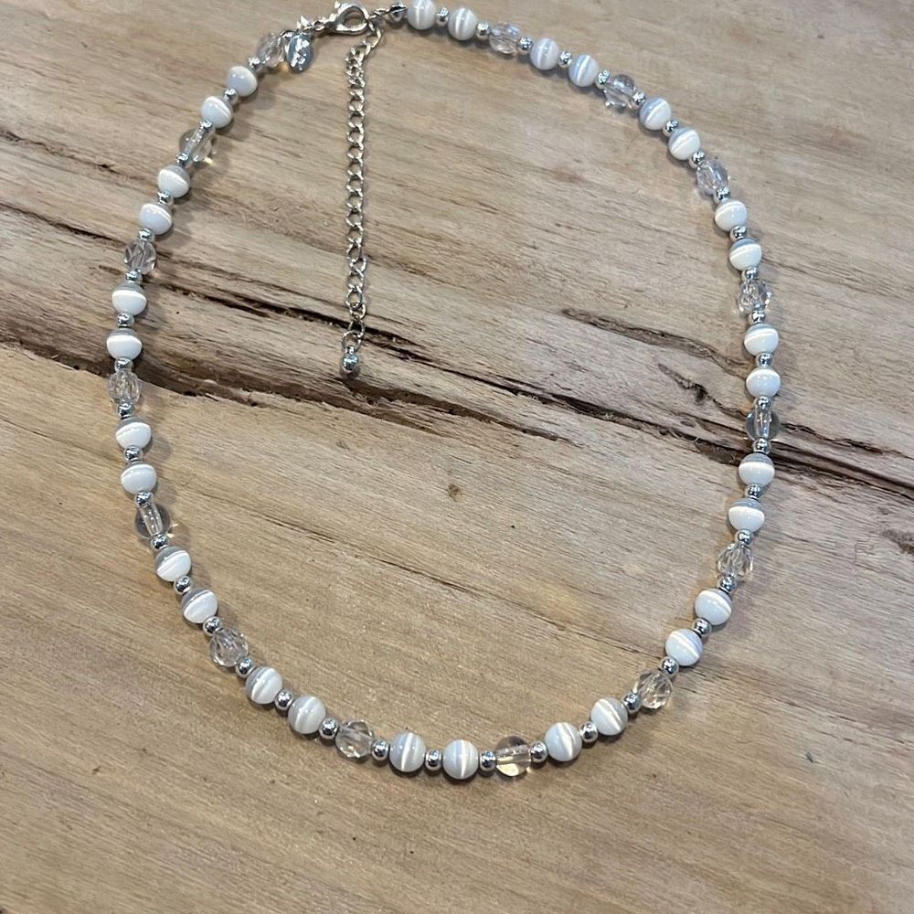 Spun White And Clear Beads On A Silver Tone Stamped KR